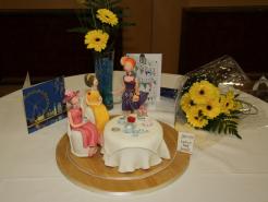 Large cake depicting ladies who lunch